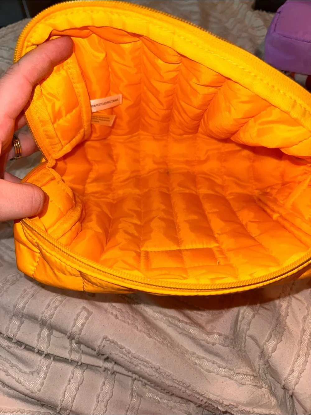 Sol de Janeiro yellow cosmetic bag